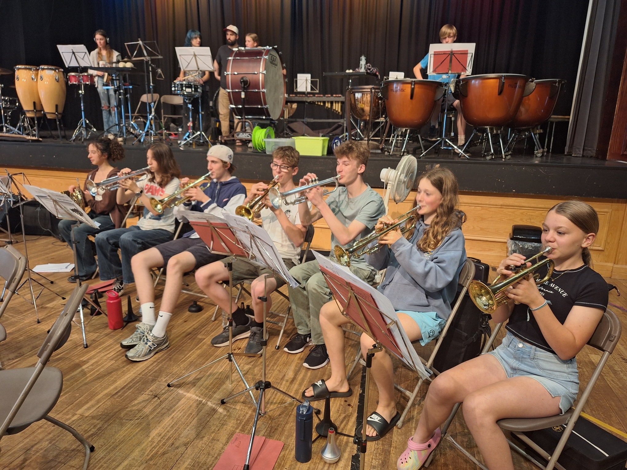 Children playing trumpets at summer residential course in Monmouth