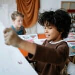 child in arts workshop
