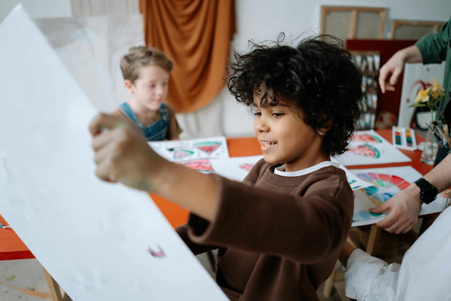 child in arts workshop